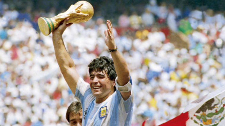 Maradona of Argentina holds the World Cup trophy after defeating West Germany 3-2 during the 1986 FIFA World Cup Final match at the Azteca Stadium on June 29, 1986 in Mexico City, Mexico